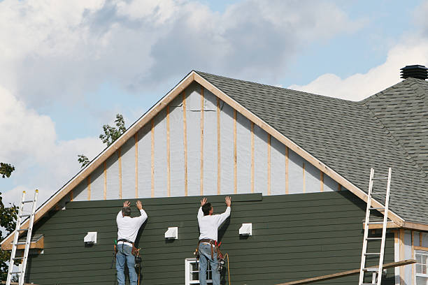 Professional Siding technician working in Middletown, NY